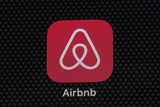 Airbnb shares surge as Wall St cheers strong forecast, cost controls