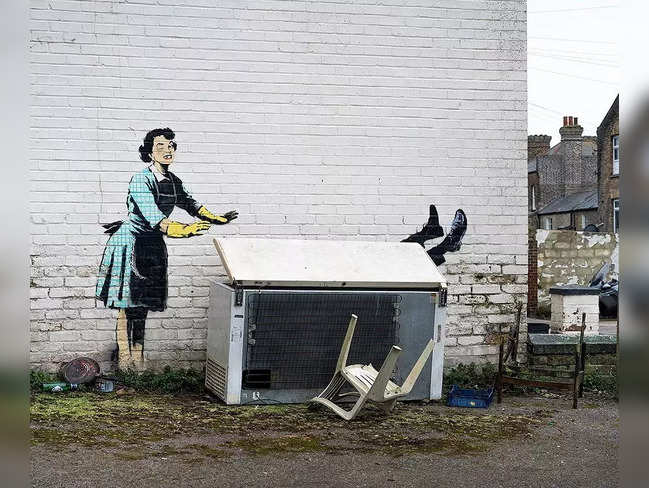 An artwork depicting violence against women, painted by street artist Banksy for the occasion of Valentines Day, in Margate