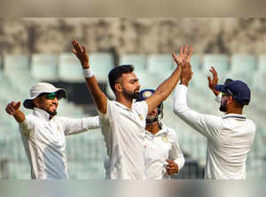 Kolkata: Saurashtra's bowler Jaydev Unadkat celebrates the wicket of Bengal's ba...