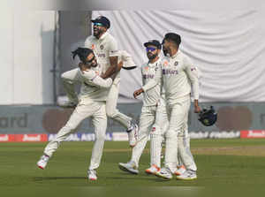 New Delhi: Indian bowler Ravindra Jadeja celebrates with teammates after the wic...