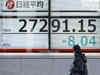 Asian shares muted by unease over Fed, BOJ policy