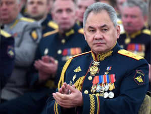 FILE PHOTO: Russian Defence Minister Sergei Shoigu meets graduates from military academies in Moscow
