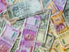 Rupee nudges higher as dollar dips; eyes on Fed minutes