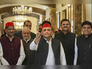 Lucknow: Samajwadi President Akhilesh Yadav with party MLAs arrives to attend th...