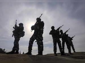 Jammu: Central Reserve Police Force (CRPF) jawans keep a watch on the Jammu & Ka...