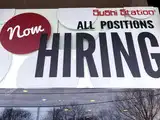 U.S. weekly jobless claims fall ; fourth-quarter growth trimmed