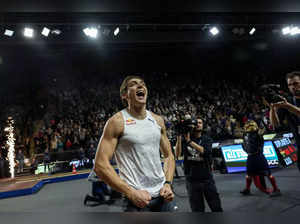 Swedish athlete Armand Duplantis celebrates after setting a new pole vault world record (6.22m) after competing in the men's pole vault event at the International indoor athletics meeting All Star Perche at the Sports House in Clermont-Ferrand, central France, on February 25, 2023.  (Photo by ARNAUD FINISTRE / AFP)