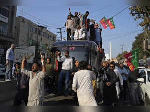 Supporters of Pakistan's former prime minister Imran Khan's 'Pakistan Tehreek-e-...