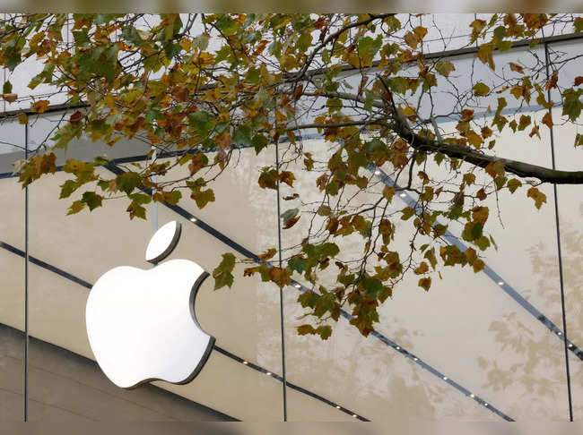 FILE PHOTO: The Apple Inc logo is seen at the entrance to the Apple store, in Brussels