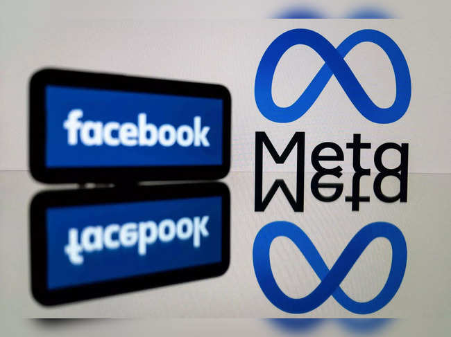 (FILES) This file illustration photo taken on January 12, 2023 in Toulouse, southwestern France, shows a smartphone and a computer screen displaying the logos of the social network Facebook and its parent company Meta. Facebook and Instagram owner Meta will launch a paid subscription service allowing users to verify their accounts, among other features, CEO Mark Zuckerberg said on February 19, 2023. (Photo by Lionel BONAVENTURE / AFP)