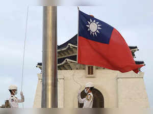 Taiwan says 25 Chinese planes, 3 ships sent toward island