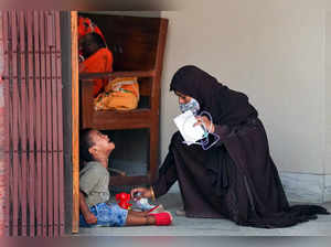 Kolkata: A mother pacifies her child with Acute Respiratory Infections (ARI), at...