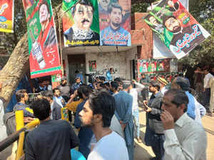 **EDS: TO GO WITH STORY** Lahore: Imran Khan's supporters gathered outside his L...