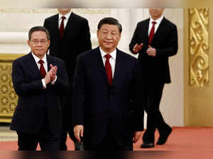 FILE PHOTO: New Politburo Standing Committee members in Beijing