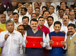 Mumbai: Maharashtra Deputy CM and Finance Minister Devendra Fadnavis with State ...