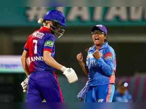Mumbai: Mumbai Indian's Saika Ishaque celebrates the wicket of Delhi Capitals Sh...