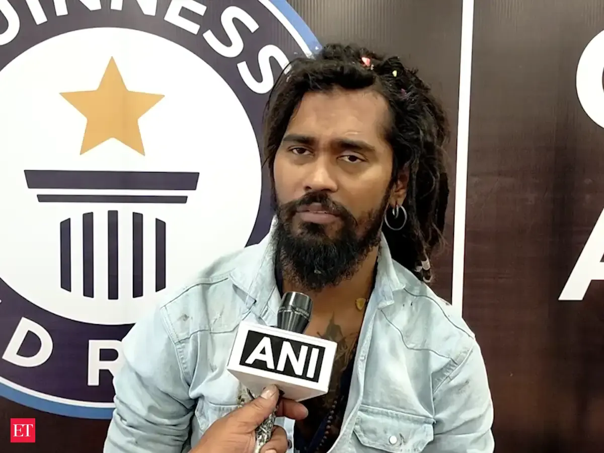 ishan rana: Gujarat: Ishan Rana, Tattoo artist sets Guinness record ...