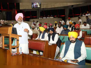 Chandigarh: Punjab Finance Minister Harpal Singh Cheema presents the state budget during the budget session in Chandigarh on Friday, March 10, 2023. Punjab CM Bhagwant was also seen. (Photo: Ajay Jalandhari/IANS)
