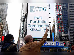 FILE PHOTO_ A screen announces the listing of Private-equity firm TPG, during the IPO at the Nasdaq Market site in Times Square in New York.