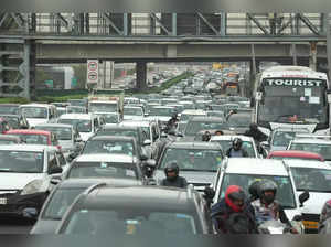 New Delhi: Vehicles enroute to Gurugram stuck in a traffic jam, in wake of the v...