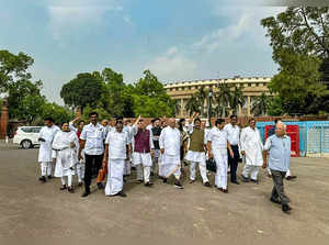 New Delhi: Opposition MPs in the Rajya Sabha during a march towards Vijay Chowk ...