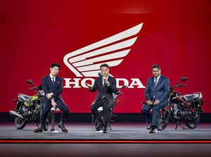 Mumbai: Honda Motorcycle & Scooter India President, CEO & MD Atsushi Ogata (cent...