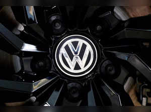 FILE PHOTO: FILE PHOTO: The logo of German carmaker Volkswagen is seen on a rim cap in a showroom of a Volkswagen car dealer in Brussels