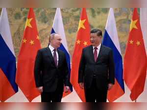 FILE PHOTO: Russian President Vladimir Putin attends a meeting with Chinese President Xi Jinping