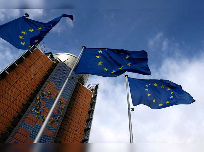 FILE PHOTO: European Union flags flutter outside the EU Commission headquarters in Brussels, Belgium