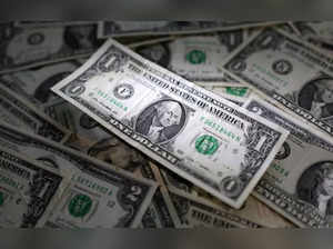 Illustration shows U.S. dollar banknotes