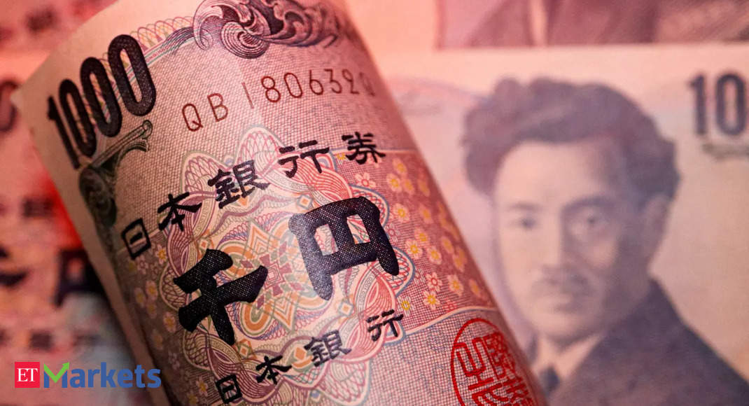 Yen drops, dollar on defensive as central banks seek to reassure markets
