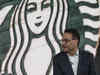 Starbucks new CEO Laxman Narasimhan takes his seat