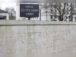FILE PHOTO: A general view of the New Scotland Yard sign outside the police headquarters, in London