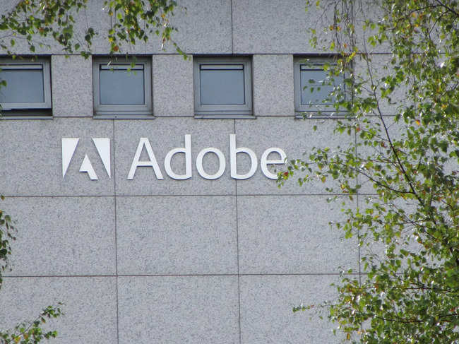 FILE PHOTO: Logo of Adobe Inc. is pictured at the company's office in Citywest Business Campus, Saggart