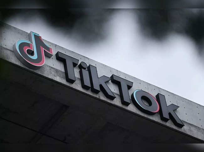 (FILES) In this file photo taken on March 16, 2023 the TikTok logo is displayed outside TikTok social media app company offices in Culver City, California. TikTok CEO Shou Zi Chew said March 21, 2023 that US user numbers had soared to 150 million -- almost half the total population -- as he prepared to fight at US Congress for the Chinese owned site's future. (Photo by Patrick T. Fallon / AFP)
