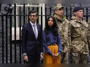 Britain's Prime Minister Rishi Sunak and his wife Akshata Murty joined outside 1...