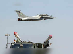 Bengaluru: Indian Air Force's Rafale aircraft flies past during the last day of ...