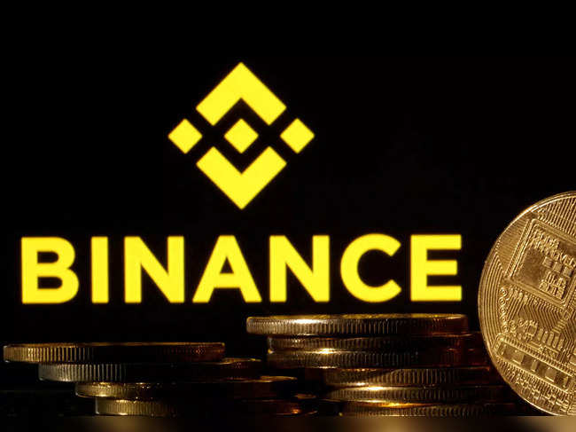 FILE PHOTO: A composition showing crypto currency with the Binance logo