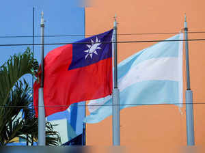 FILE PHOTO: The flags of Taiwan and Honduras flutter in the wind outside the Taiwan Embassy in Tegucigalpa