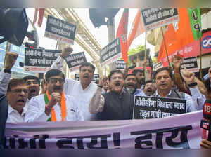 Mumbai: BJP workers protest against Congress leader Rahul Gandhi demanding an ap...