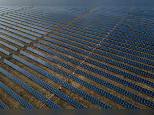 (FILES) In this file aerial photo taken on March 1, 2023, shows solar panels part of ENGIE Sun Valley Solar project in Hill County, Texas. Modern Texas was built on oil, and its production has long been a source of immense pride. But now, areas that moved to the steady rhythm of oil derricks for more than a century are making the state a national leader in wind and solar energy. (Photo by Mark Felix / AFP  / AFP)