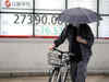 Japan's Nikkei bounces as weaker yen lifts sentiment; banks weigh