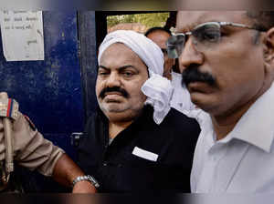 Ahmedabad: Prayagraj Police with jailed-mafia Atiq Ahmed outside Sabarmati Centr...