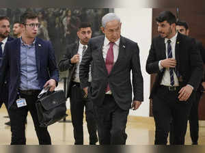 Israel's Prime Minister Benjamin Netanyahu walks at the Knesset, Israel's parlia...