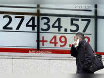Japan shares end higher as bank stocks rise amid easing financial crisis fears