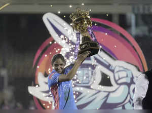 Mumbai: Mumbai Indian's captain Harmanpreet Kaur  with  the winning trophy durin...