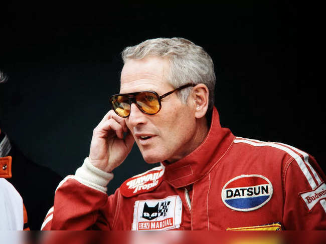 (FILES) In this file photo taken on June 09, 1979 US actor and driver Paul Newman is pictured, during 24 Hours of Le Mans car race in Le Mans. The legendary American actor Paul Newman, who died in 2008, was also an accomplished car racer and a lover of fine watches: two of his Rolex Daytona will be auctioned in New York in June, Sotheby's announced on March 28, 2023, expecting a million dollars for each. (Photo by AFP)