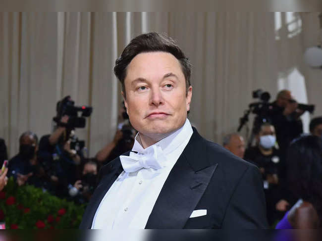 (FILES) In this file photo taken on May 02, 2022 Elon Musk arrives for the 2022 Met Gala at the Metropolitan Museum of Art in New York. Twitter owner Elon Musk on March 17, 2023 put out word that he will make public the long-secret algorithm for recommending tweets. The code used for recommending the posts suggested to users will become "open source" at the end of March, Musk said in a tweet of his own. (Photo by Angela Weiss / AFP)