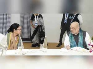 Howrah:Union Home Minister Amit Shah with West Bengal Chief Minister Mamata Banerjee on the sidelines of the 25th meeting of the Eastern zonal council at Nabanna in Howrah on Saturday December 17,2022.(Photo:IANS)