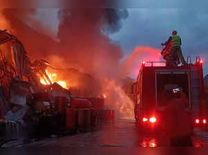 This handout photograph released by Pakistan's Emergency Rescue 1122 Service on April 4, 2023 shows firefighters trying to extinguish a fire that erupted at a warehouse of a hydropower dam construction site in Dasu, the main town in Upper Kohistan district of Pakistan's Khyber Pakhtunkhwa province. A fire ripped through the camp of a Chinese company managing the construction of a remote hydropower dam in northwestern Pakistan on April 4, officials said. - RESTRICTED TO EDITORIAL USE - MANDATORY CREDIT "AFP PHOTO/Pakistan's Emergency Rescue 1122 Service" - NO MARKETING NO ADVERTISING CAMPAIGNS - DISTRIBUTED AS A SERVICE TO CLIENTS (Photo